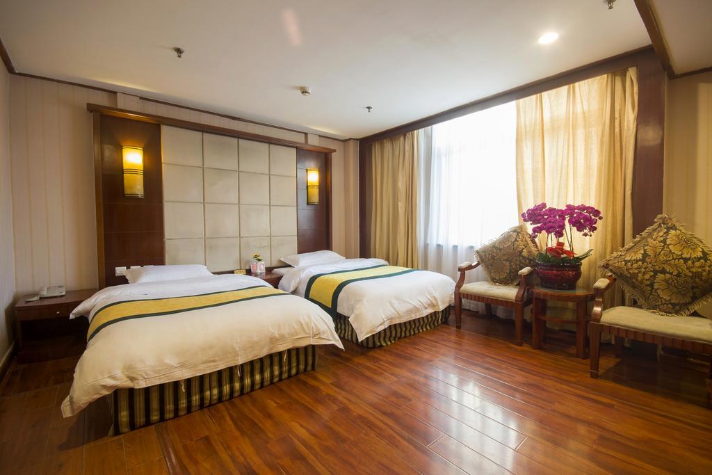Dalian Yicheng Business Hotel Habitación foto
